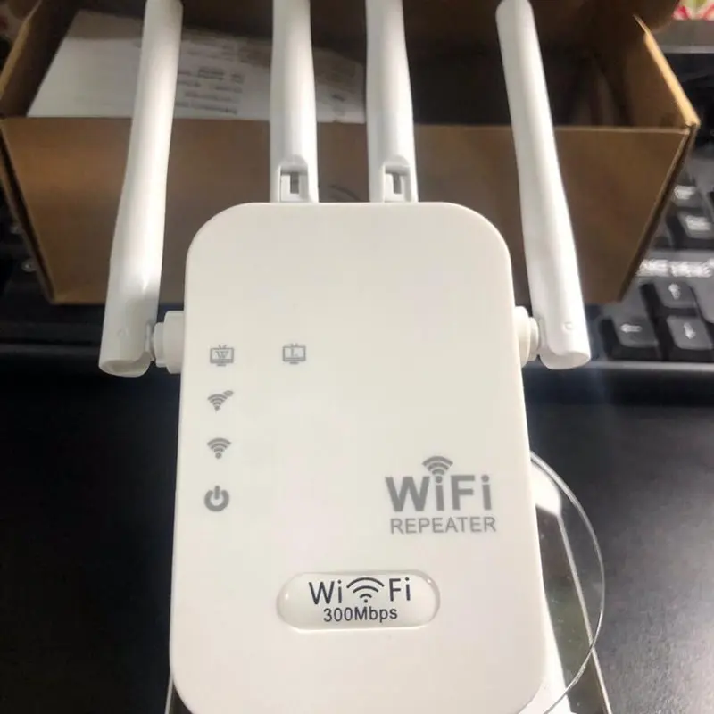 Bộ mở rộng sóng wifi 4 râu tốc độ 300mbps phù hợp với gia đình và văn phòng máy tính ti vi camera - Chuẩn N - Phát xuyên tường - Có 2 cổng LAN 8