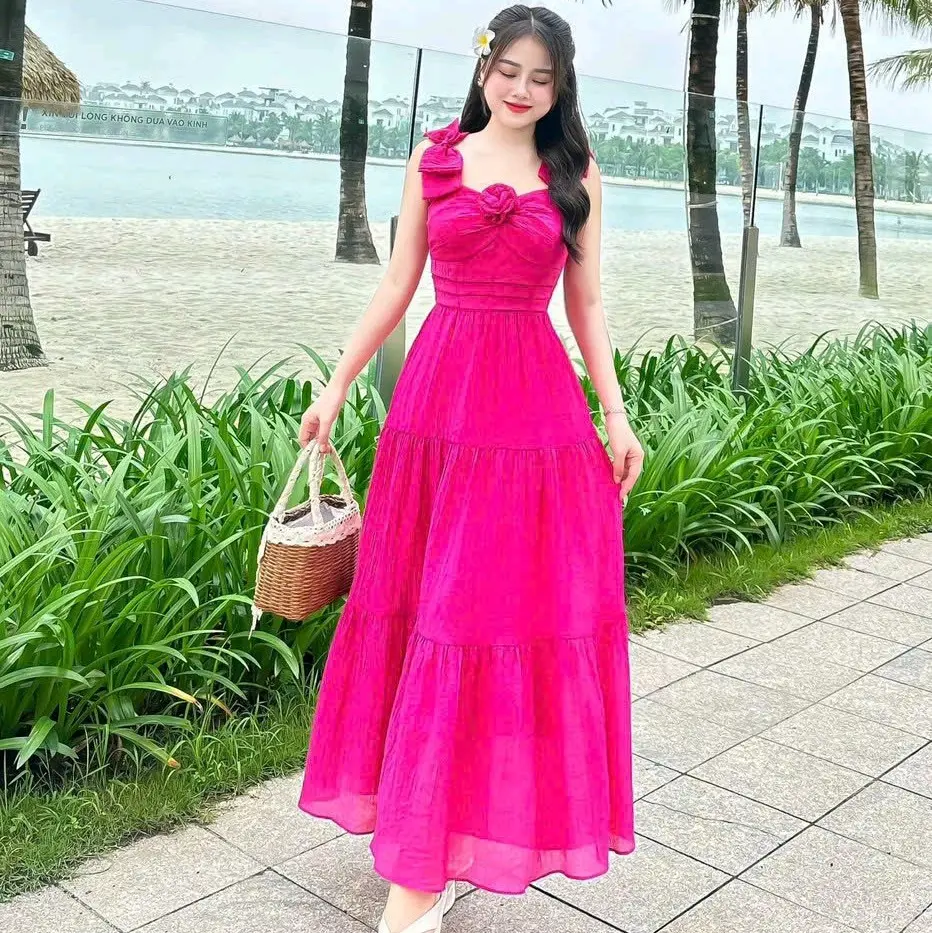 Đầm maxi thời trang nữ mặc đi biển chất tăm gãy vai nơ ngực gắn bông váy dài xòe maxi có lót trong có 5 màu như hình qc Màu Hồng