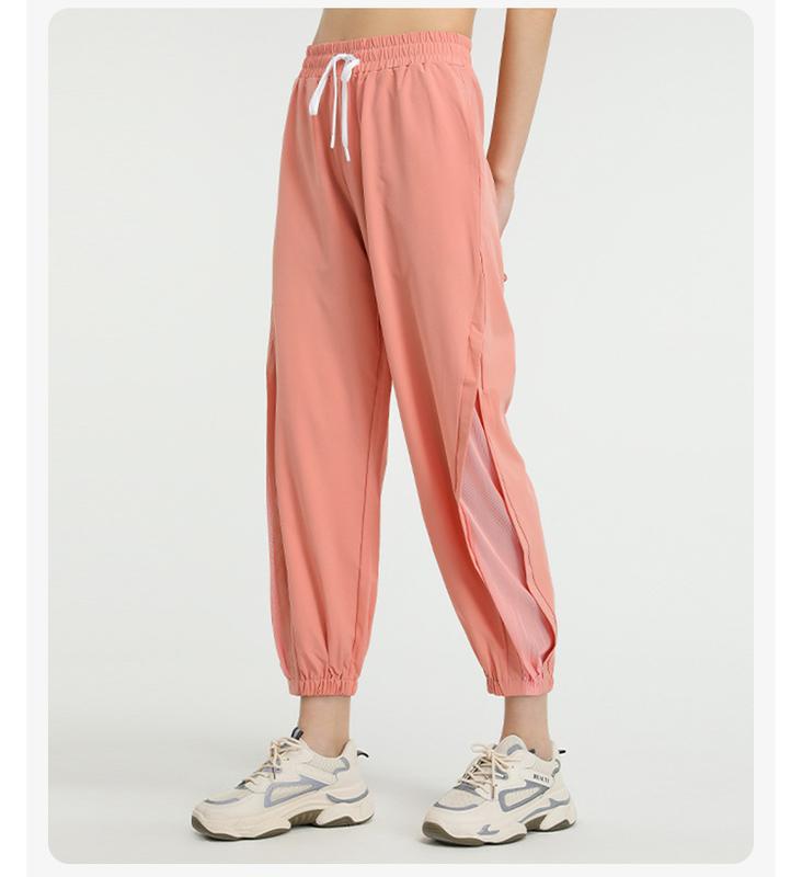 Product Introduction of Loose high-waisted quick-drying pants European and American mesh quick-drying yoga trousers running sports tied feet large-size fitness pants women 14