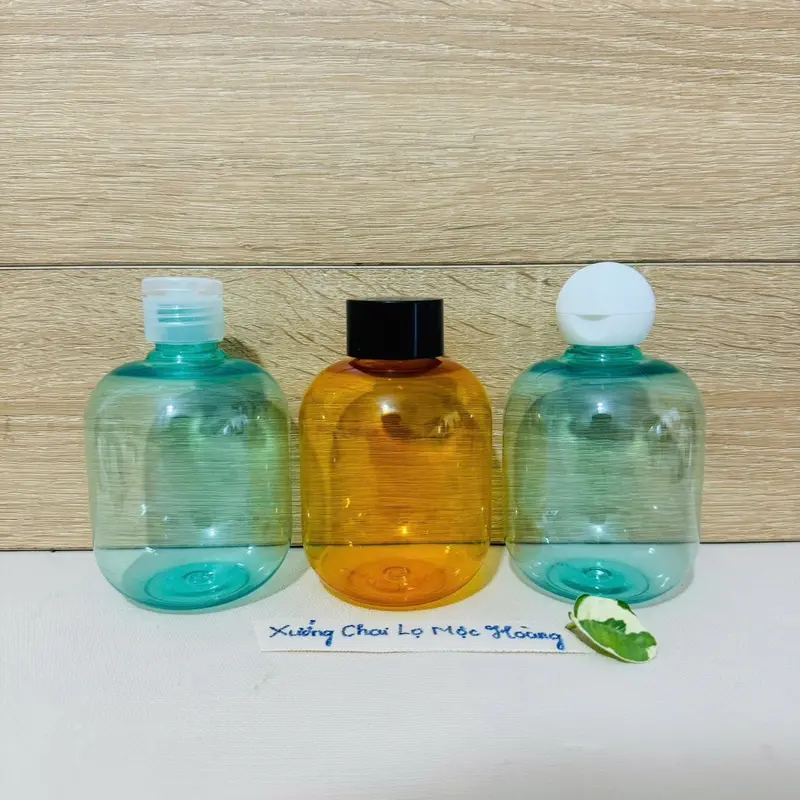 Chai lọ nhựa 300ml Tròn Lùn màu Xanh Ngọc/Cam Trong - Vòi nhấn cao cấp đủ loại -Khóa Vàng-Nắp Bật 7
