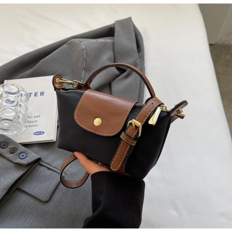 Product Introduction of Retro Explosions Handbag Shoulder Crossbody Bag Carrying High-grade Nylon Jiaozi Bag. 18