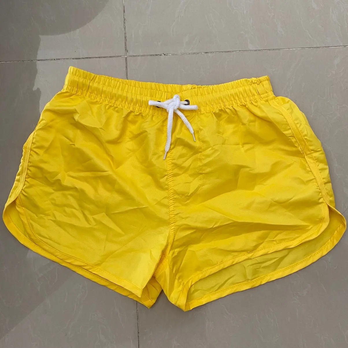 Celana sport pantai cowok cewek