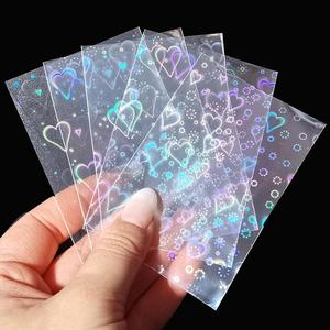 Funda para fotocard con patrón de corazón, 50 piezas por paquete, funda para tarjetas láser, película holográfica para la creación de tarjetas, suministros para scrapbooking DIY, suministros para regalos y envoltura
